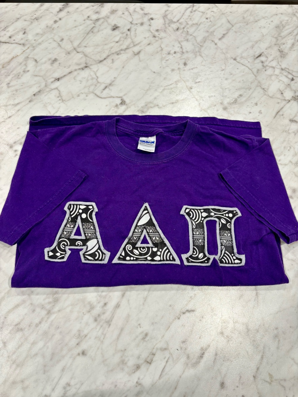 Gildan Purple Short Sleeve Shirt with Black & White Patterned ADPI Greek Letters